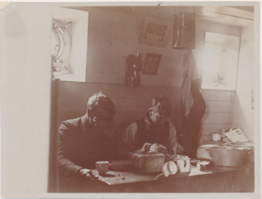 Photograph - Gelatin silver photograph, Mr and Mrs Gurney Goldsmith, Dinner is served on board a sailing ship - Eating It in the Half Deck, 1906