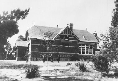Photograph, Ringwood State School No. 2997 viewed northward from Maroondah Highway.  C1912 After building partitioned