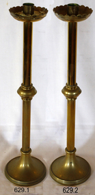 Pair of brass candlestick holders, brass, with scalloped edged wax cup, bulbous decoration on stem and round base