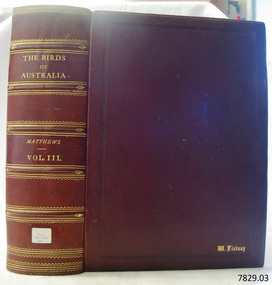 Brown hard cover with embossed gold sping