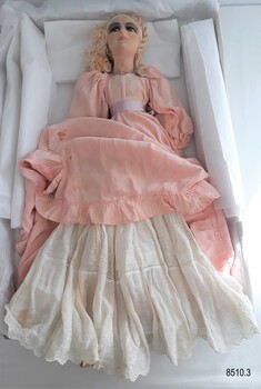 Front view of the white embroidered petticoat on a Boudoir Doll.