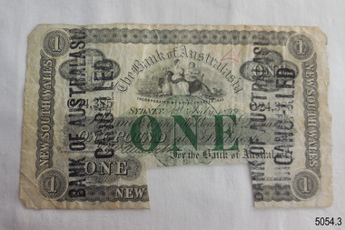 One-pound note printed in black with green. Cancellation stamp. Rectangular notch on bottom edge.