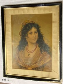  A female figure wearing a simple dress with a crucifix around her neck, on a brown background, in a black frame.