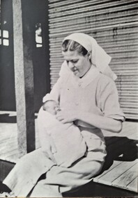 Photograph, Sister Melrose and baby, copy 1989 original 1942