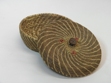 Decorative basket, Handmade by Mrs. Ada Newcombe, circa 1939