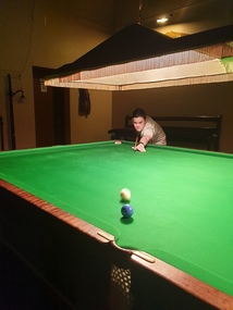 Photograph, Clare Gervasoni, Jarred  Lee Plays Billiards at the Old Colonists' Hall, 14/05/2021