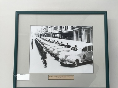 Photograph, framed, The Fleet and Officers on parade outside Headquarters in Lonsdale Street - circa 1940