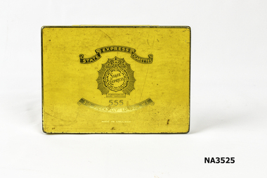 Oblong tin with lid painted yellow with gold writing