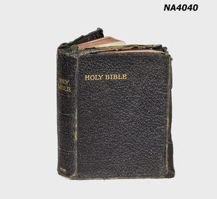 Bible covered in black leather.