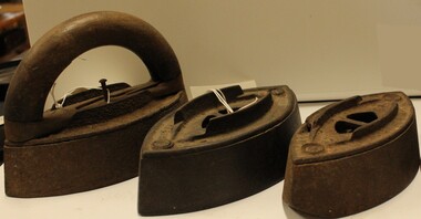 Set of Mrs Potts' sad irons with interchangeable handle