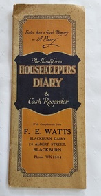 A faded and stained tall narrow pale green 1933 Handiform Housekeepers Diary & Cash recorder.