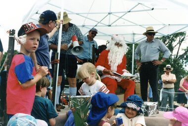 Photograph, Faye Lamb, Christmas picnics at Heidelberg Golf Club - Santa with children, 1990
