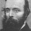 Image depicts close up portrait of Robert O'Hara Burke, with just head and shoulders in shot.