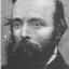 Image depicts close up portrait of Robert O'Hara Burke, with just head and shoulders in shot.