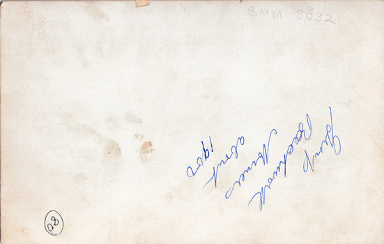 Rear of photograph with some dirt/fingerprint smudges
