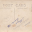 The back of the postcard with the postage stamp.