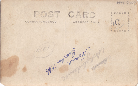 The back of the postcard with the postage stamp.