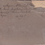 The reverse side of a photograph. The reverse has a large tear in the top right-hand side with text identifying the men in the photo. 