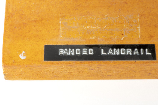 Label on wooden pedestal: Banded Landrail