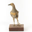 Buff-Banded Rail bird standing on a wooden platform facing forward
