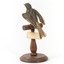 Satin Flycatcher standing on wooden perch facing forward