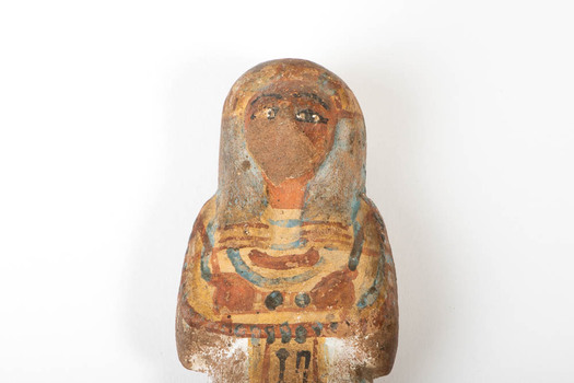 Close up of the Ushabti figure head and upper torso