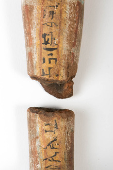 Close up of the Ushabti figure inscriptions and damage