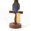 Azure Kingfisher standing on wooden perch facing forward