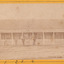 Image of Glenrowan police station on 1 August 1882 with four men standing/sitting out front.