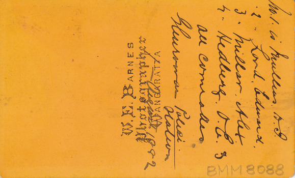 Reverse of image of Glenrowan police station on 1 August 1882 with four men standing/sitting out front.