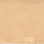 Reverse of the photograph showing a blank card with some inscription