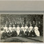 Mounted photograph of mental hospital staff, nurses and male workers. 16 men in 2 rows, with a row of female nurses in between. 2 men in the photo have 'Kepi' style hats.