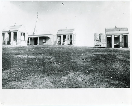 4 early cottages (weatherboard buildings)