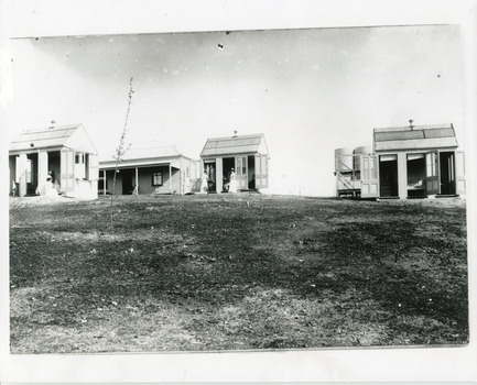 4 early cottages (weatherboard buildings)