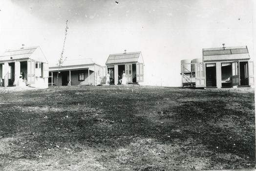 4 early cottages (weatherboard buildings)