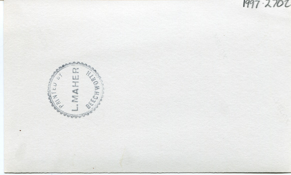 Matte card with 1997.2702 written in pencil in the top right corner. Stamped with an embellished round stamp saying "PRINTED BY L.MAHER BEECHWORTH"