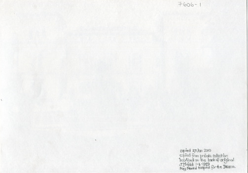 Back of a photograph that features the Beechworth Mental Asylum administration building.