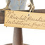 Image of swing-tag, see transcription