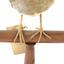 close up spotted quail standing on a wooden mount facing forward