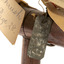 close up of metal ID tag, see transcript