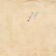 Rear of a photograph with writing in pencil and blue pen