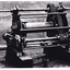 Black and white photograph shows a piece of gold mining machinery. 
