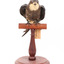 White-Throated Needletail standing on wooden perch facing forward