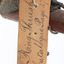 Image of swing-tag, see transcription