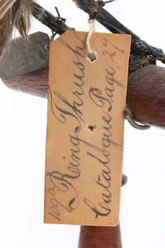 Image of swing-tag, see transcription