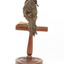 Eastern Whipbird standing on a wooden perch facing forward