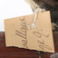 Taxidermy Dusky Woodswallow specimen standing on a wooden mount looking forward