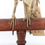 Olive-Backed Oriole standing on a wooden post mount, close-up facing forward. 