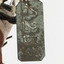 Image of metal-tag, see transcription 