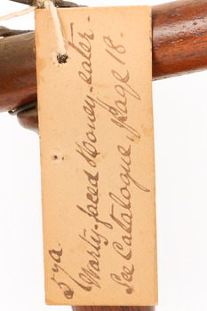 A close-up of a swing-tag (see transcription)